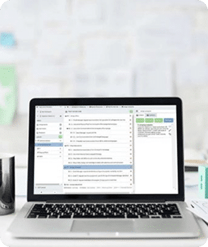 TaskTrain on a laptop on a desk